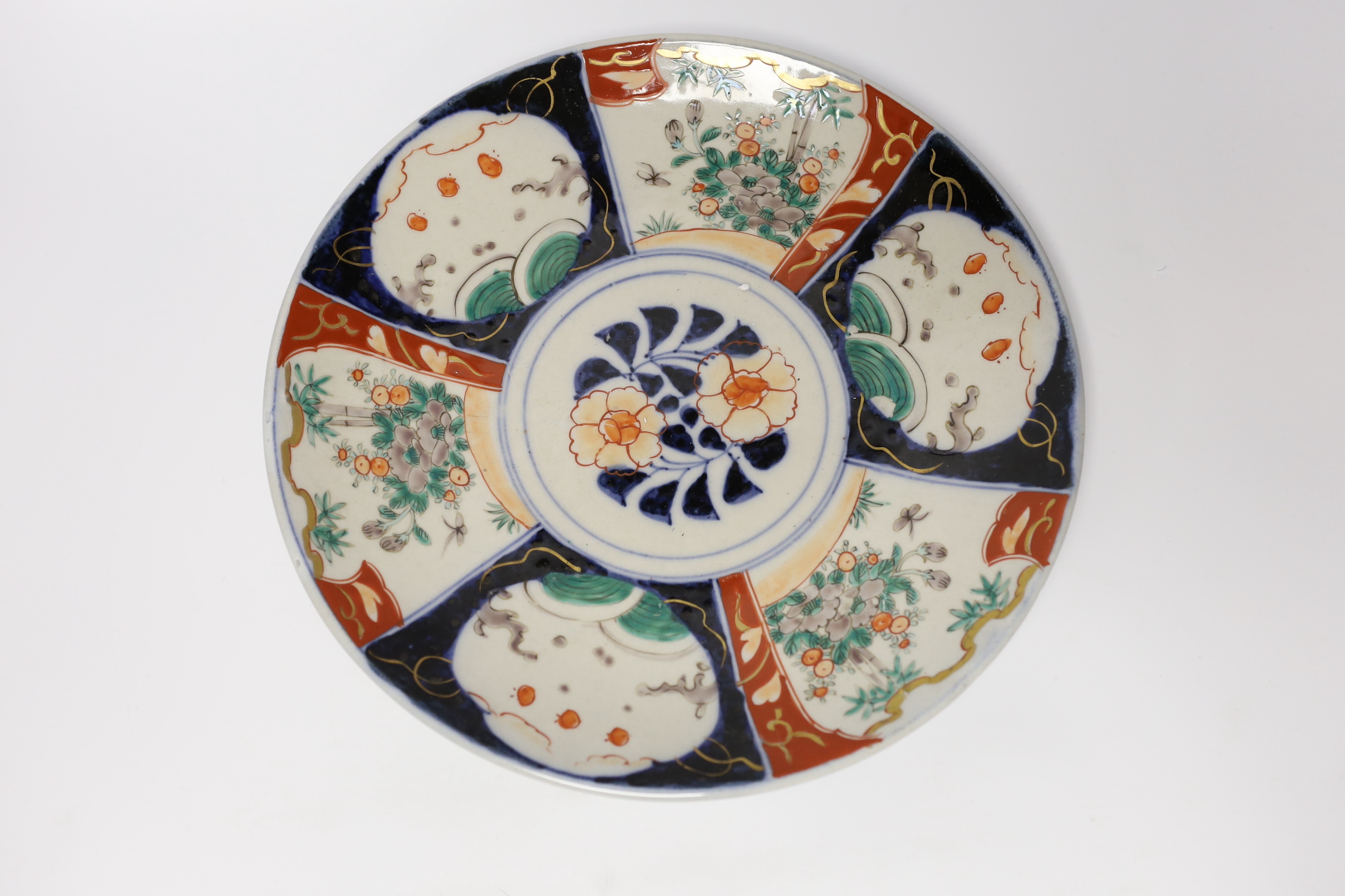 A group of Japanese Imari and kutani together with a Worcester blue and white saucer and a Chinese famille verte teabowl